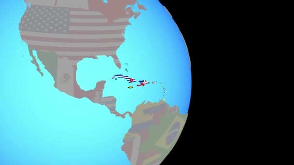Zoom na Karaiby z flagami na kuli ziemskiej — Wideo stockowe