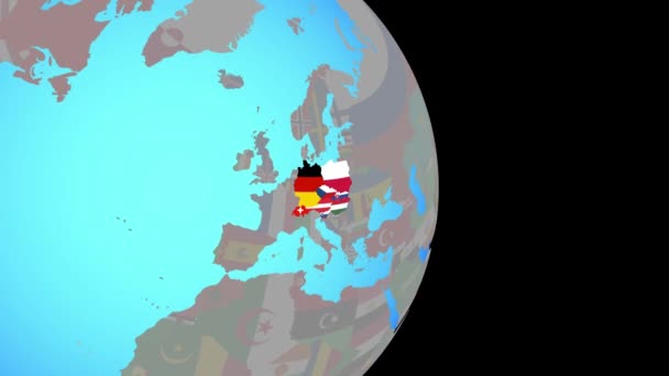 Zoom nach Mitteleuropa mit Flaggen auf Globus — Stockvideo