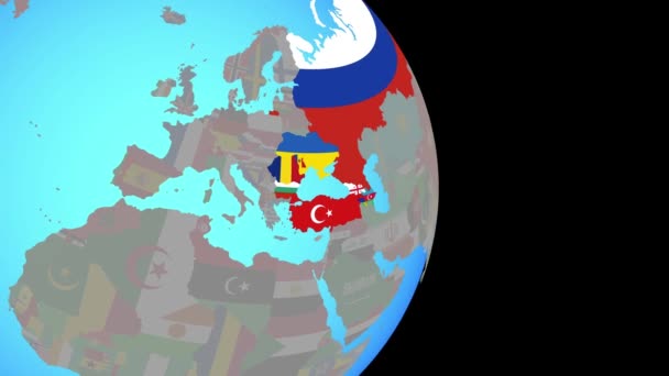 Zoom sur la région de la mer Noire avec des drapeaux sur le globe — Video