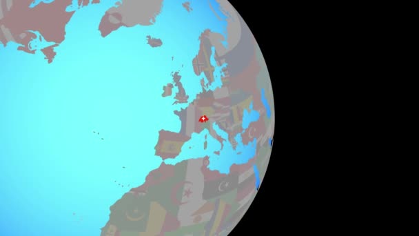 Zooma in i Schweiz med flagga på jorden — Stockvideo