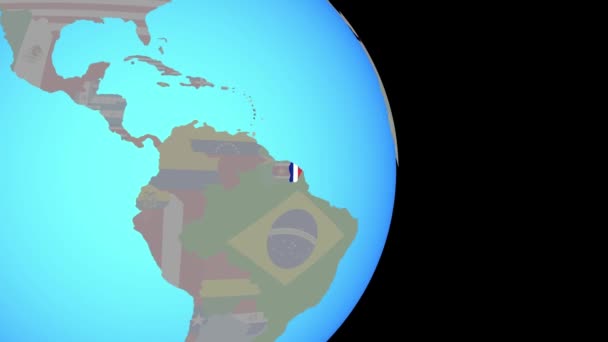 Zoom alla Guiana Francese con bandiera sul globo — Video Stock