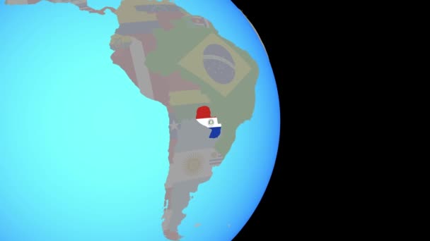 Збільшення до Парагваю з прапором на земній кулі — стокове відео