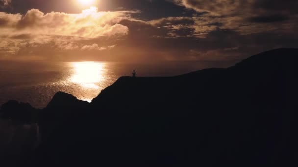 Cape Reinga lighthouse in sunset — Stock Video