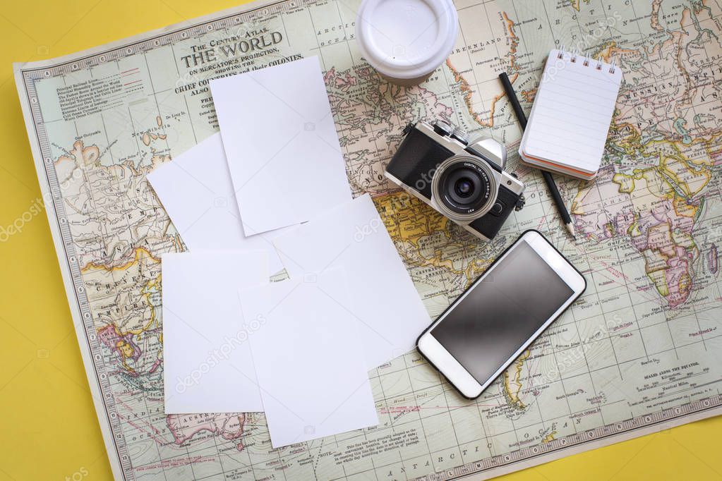 Vacations photograph showcase on world map background. Empty photograph white cards.
