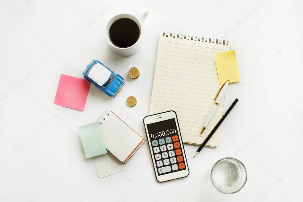 Flat lay financial planning objects table top.