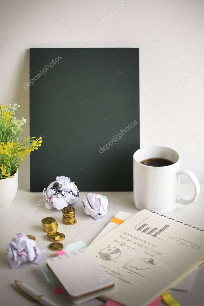 Financial planning table top with blackboard text space image.