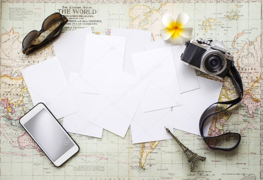 Summer vacation travel planning related object and text space table top image.