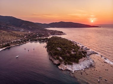 Panoramic view of Aliki gulf and yacht harbour and the ancient marble port and quarry visible to the right clipart
