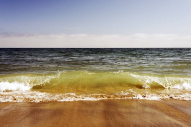 Bir deniz manzarası, Pasifik Okyanusu, dalgalar ve köpükler ve sıçrama, Malibu, Kaliforniya bir görünüm