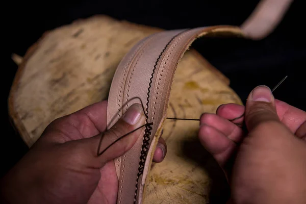 Leather stitching by hand Do every step by hand, do not use machines Resulting in a product that is valuable and durable