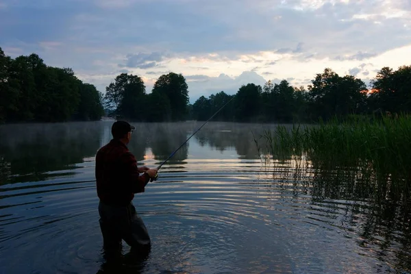 Silhouette Fisherman Standing Lake Catching Fish Sunris — Stock Photo, Image