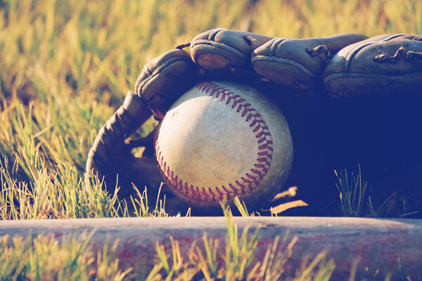Baseball in glove close up.