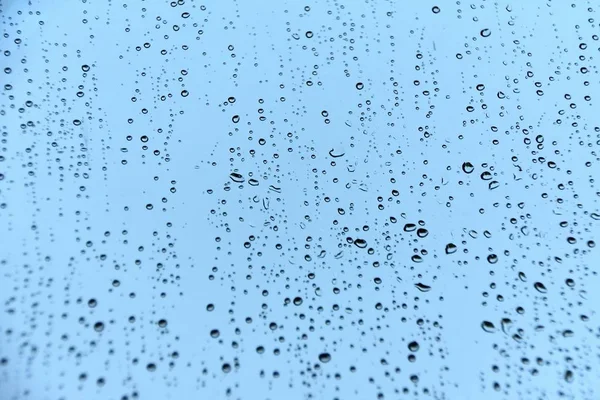 Gotas Lluvia Sobre Vidrio Con Fondo Azul — Foto de Stock