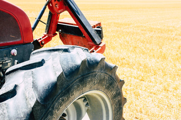Bezannes France july 07, 2018 View of a tractor working in the field in Champagne area in the afternoon