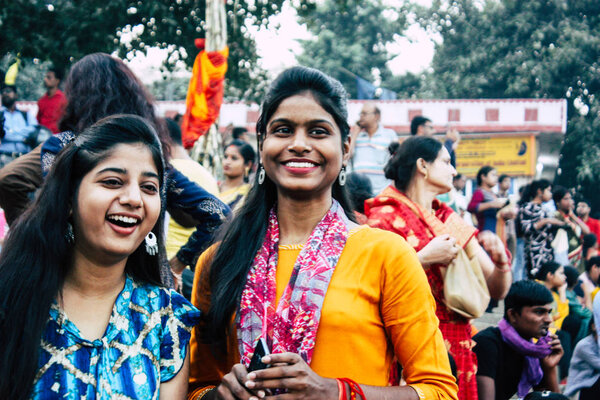 Varanasi India November 11, 2018 View of unknowns Indians people attenting and celebrating Dev Deepavali on the banks of the Ganges river in the afternoon