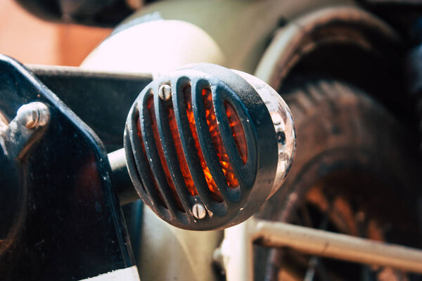 Gokarna Karnataka India February 13, 2019 Closeup of a Royal Enfield motorcycle parked in main road of Gokarna town in the morning