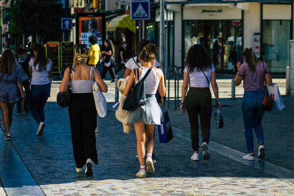Reims France September 04, 2020 View of unidentified pedestrians with a face mask to protect themself from the coronavirus walking in the streets of Reims, a city in the Grand Est region of France