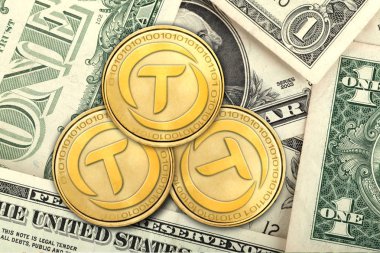 Concept of TrueUSD (or TUSD)  coin on USD Banknote clipart