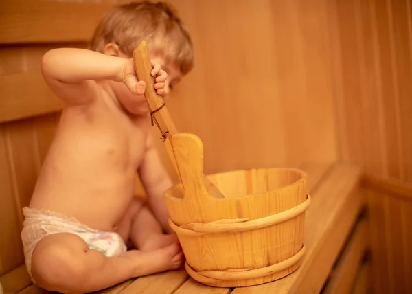 Beauty, healthcare. baby Boy relaxing in the sauna — Stock Photo, Image