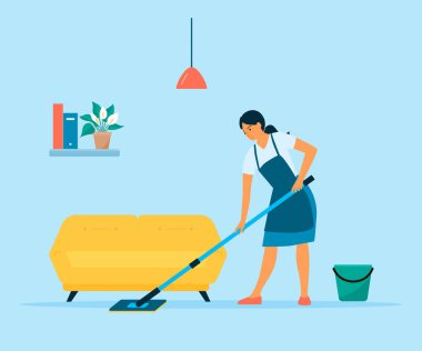 Evde ev işi yapan bir kadın. Ev hanımı paspas ve süpürge kovasıyla yerleri temizliyor.