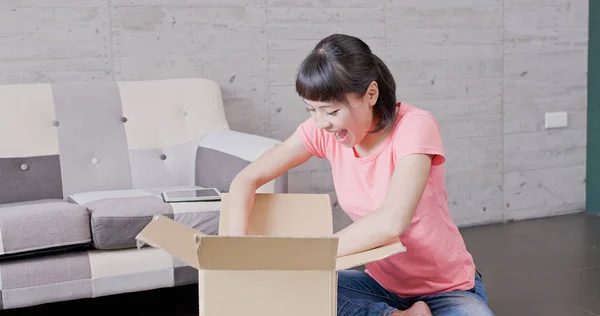 Woman Sitting Floor Opening Box — Stock Photo, Image