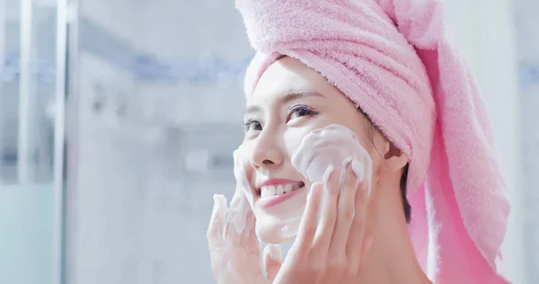 woman wash her face