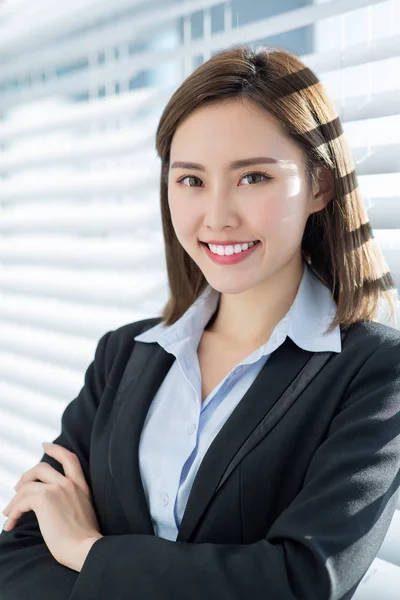 Asian business woman smile at you — Stock Photo, Image