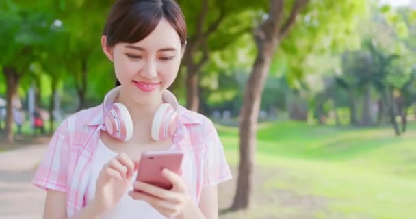 Young asian woman use phone — Stock Video