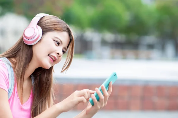 student listen music with phone