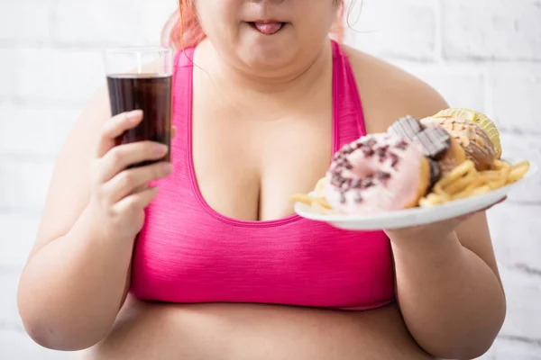 Plus size girl with dessert — Stock Photo, Image