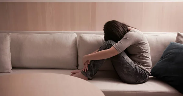 Woman feel depressed on sofa — Stock Photo, Image