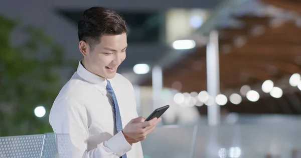 businessman use phone outdoor