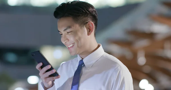 businessman use phone outdoor