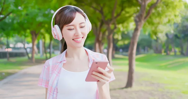 Young asian woman use phone — Stock Photo, Image