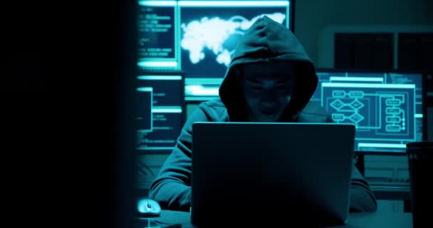 Asian male hacker use laptop — Stock Video