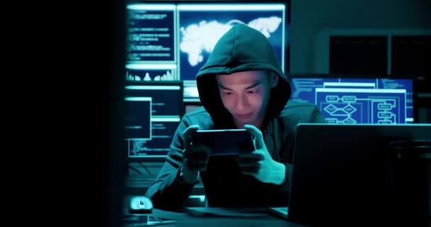 Closeup of asian male hacker — Stock Video