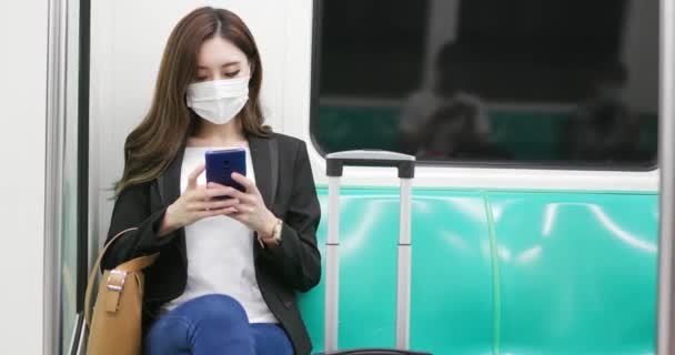 Woman with mask in mrt — Stock Video