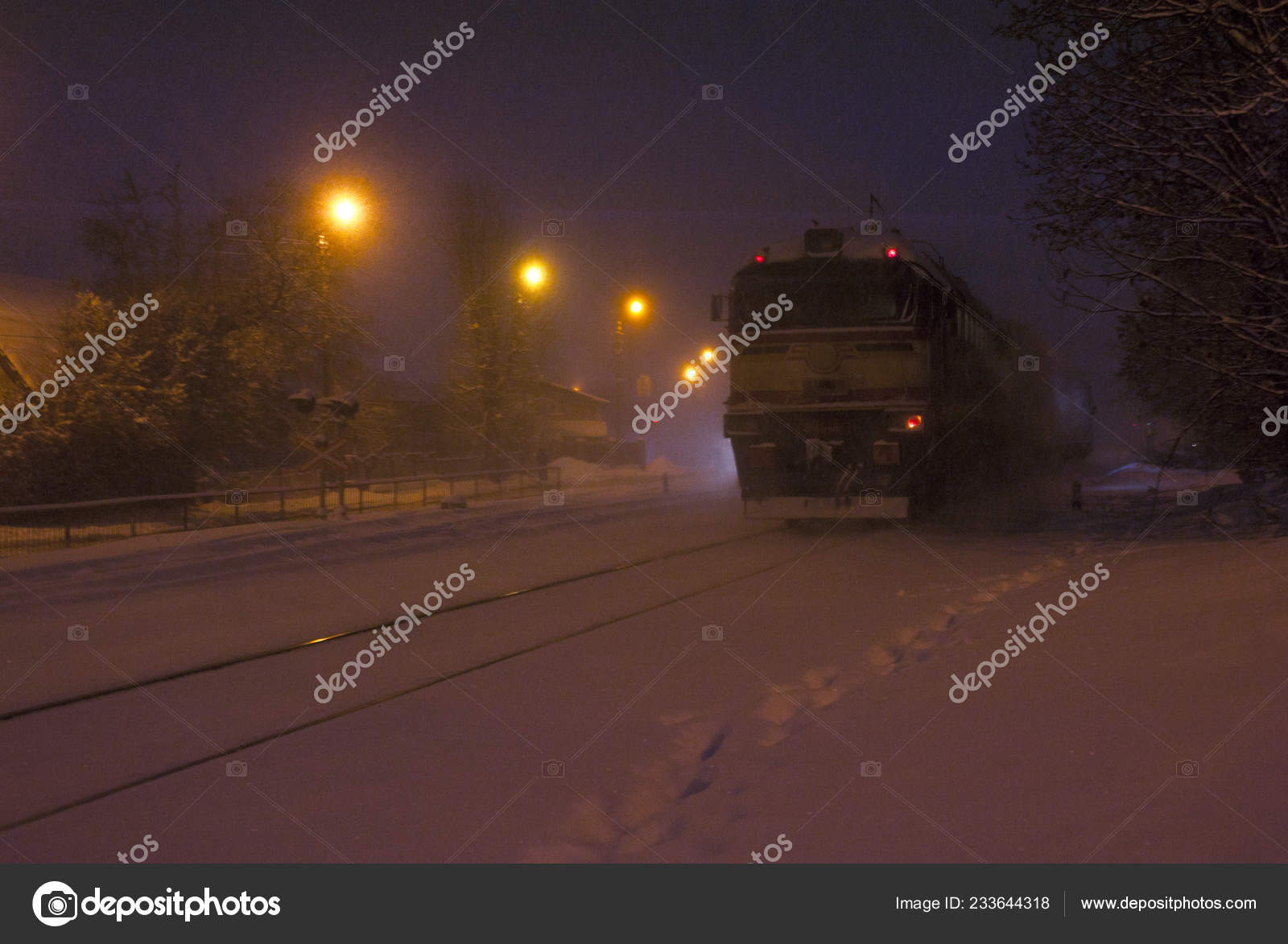picture Heavy Snow Storm Night https depositphotos com 233644318 stock photo train railway heavy snow storm html