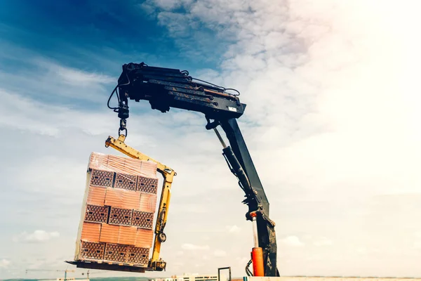 Industrial Crane Lifting Moving Brick Pallet Construction Site Moving Bricks — Stock Photo, Image