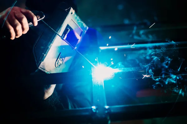 Close up details of welding process. Industrial professional worker on construction site — Stock Photo, Image
