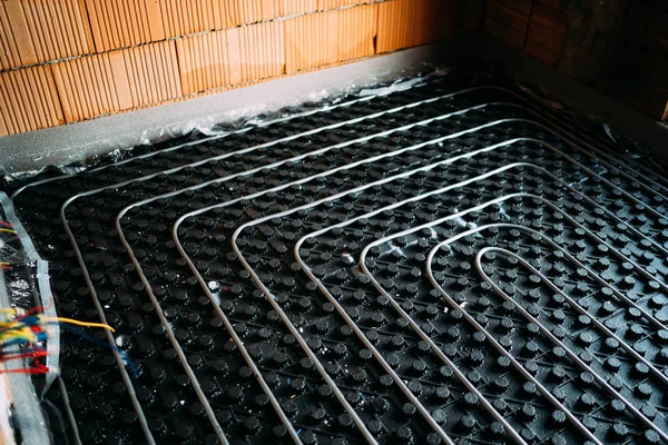 Underfloor heating pipes in house construction — Stock Photo, Image