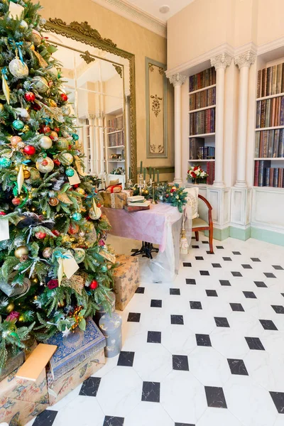 stylish vintage hall interior with decorated elegant Christmas tree