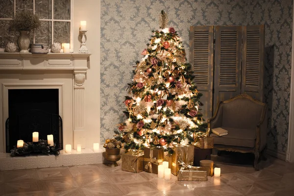 stylish vintage interior with decorated elegant Christmas tree lighting