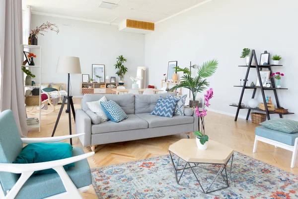 Modern interior design of studio apartment with colorful furniture