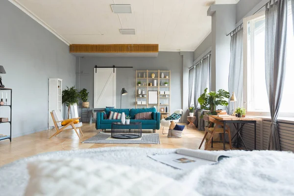 Stylish interior of studio apartment design in loft style