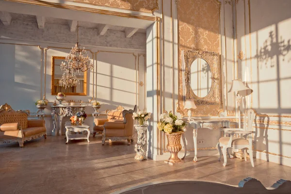 Luxury rich interior design with elegant vintage furniture in pastel colors