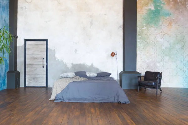 Modern interior design of studio apartment with wooden furniture