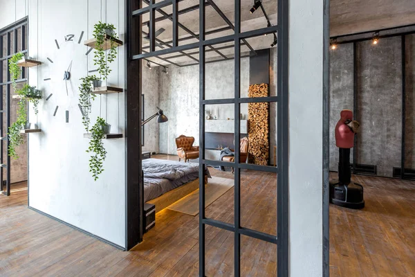 Stylish interior of studio apartment design in loft style