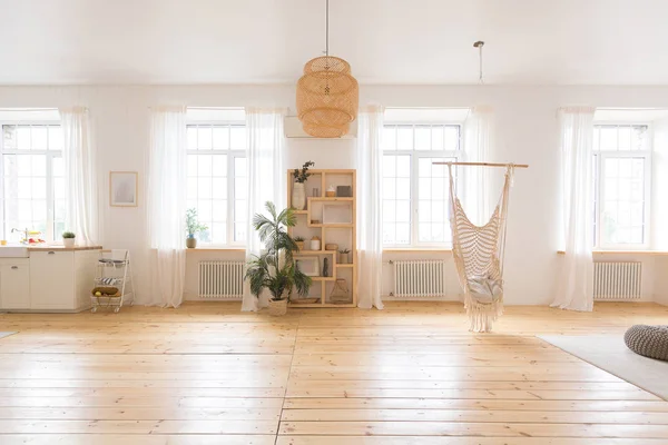 Stylish luxury interior of studio design with wooden furniture