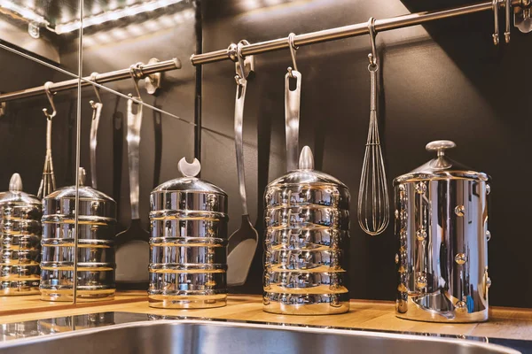 Close up view of stainless steel kitchen storage jars set — Stock Photo, Image